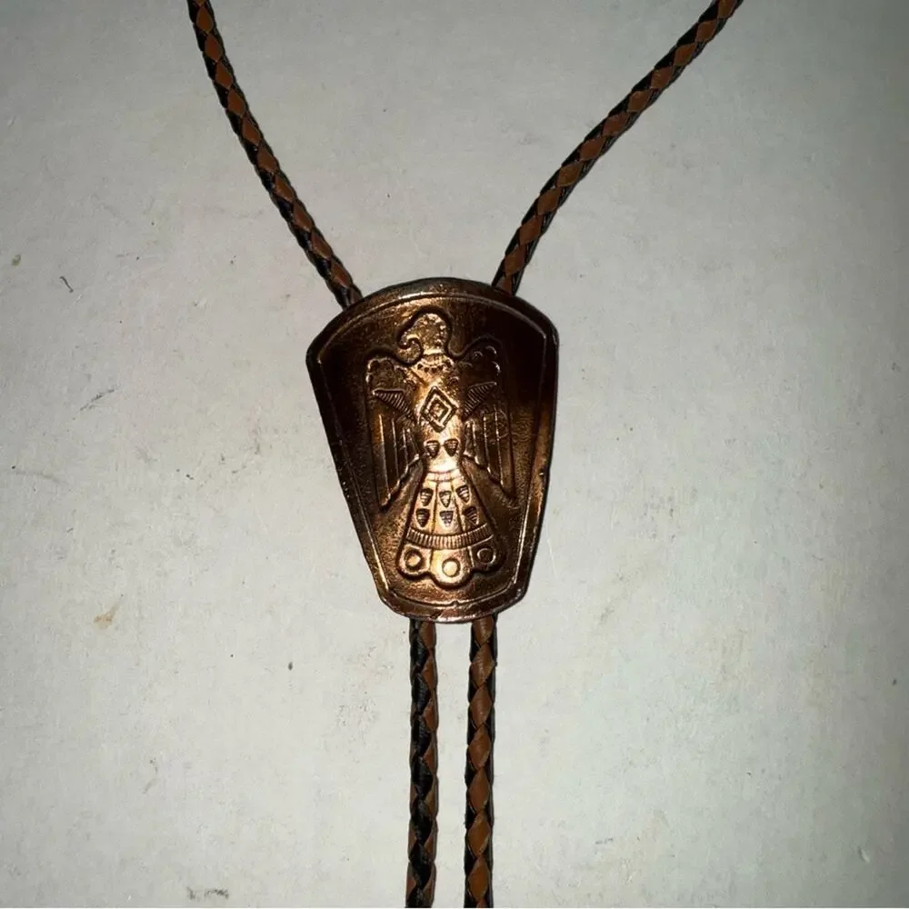 VINTAGE brass Brown Western native eagle Bolo Tie